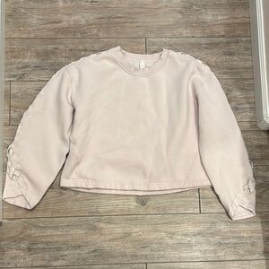 Lululemon Light Pink Cropped Sweatshirt with Lace-Up Sleeves Size 8